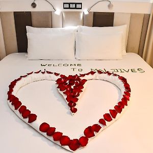 Superior Double Room Balcony & City View Return Airport Transfer on Food & Beverage